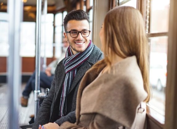 man looking at woman