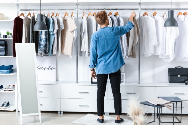man choosing clothes