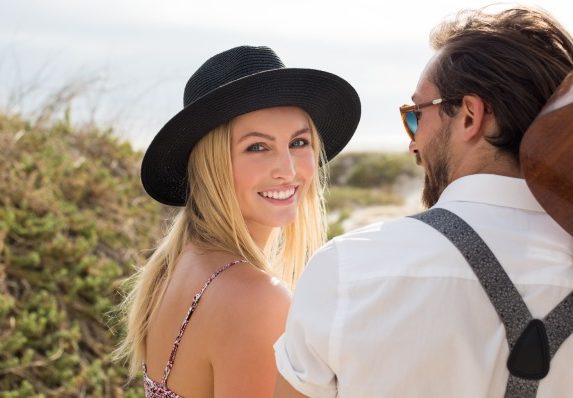 smiling girl with her boyfriend outdoor