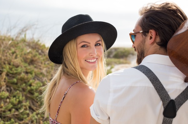 smiling girl with her boyfriend outdoor