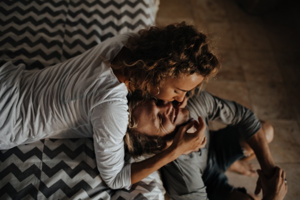 girl kisses her man