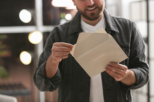 man reading a love letter